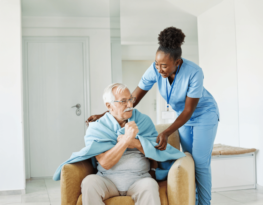 A caretaker with an elderly gentleman